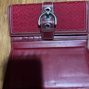 Red slightly used Coach wallet